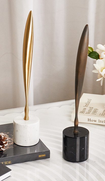 Escultura en forma de pluma Esculturas Flux Metal