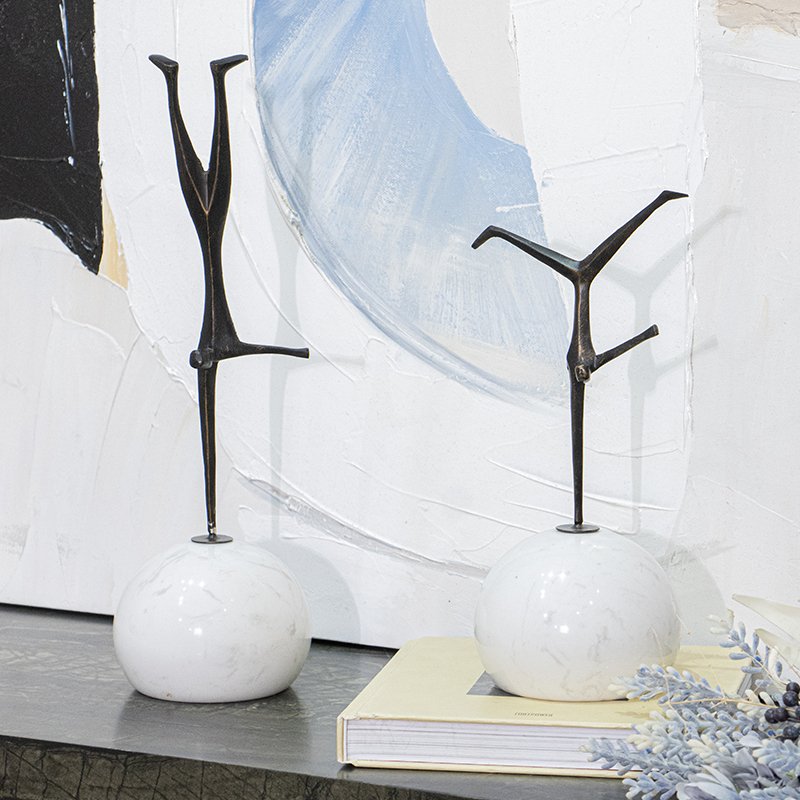 Escultura malabarista en acero Figuras de Malabaristas en Equilibrio