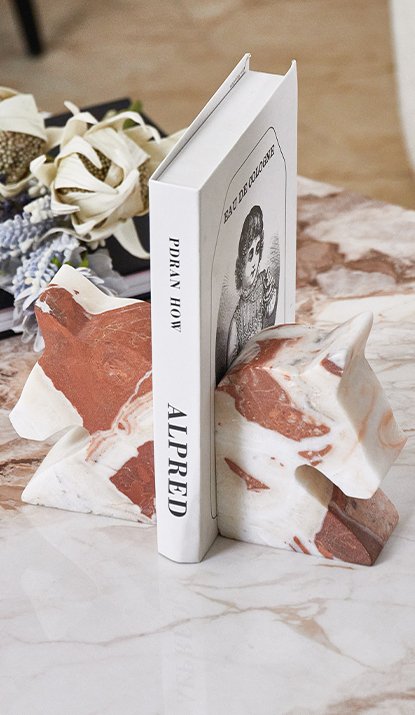 Sujetalibros en Mármol